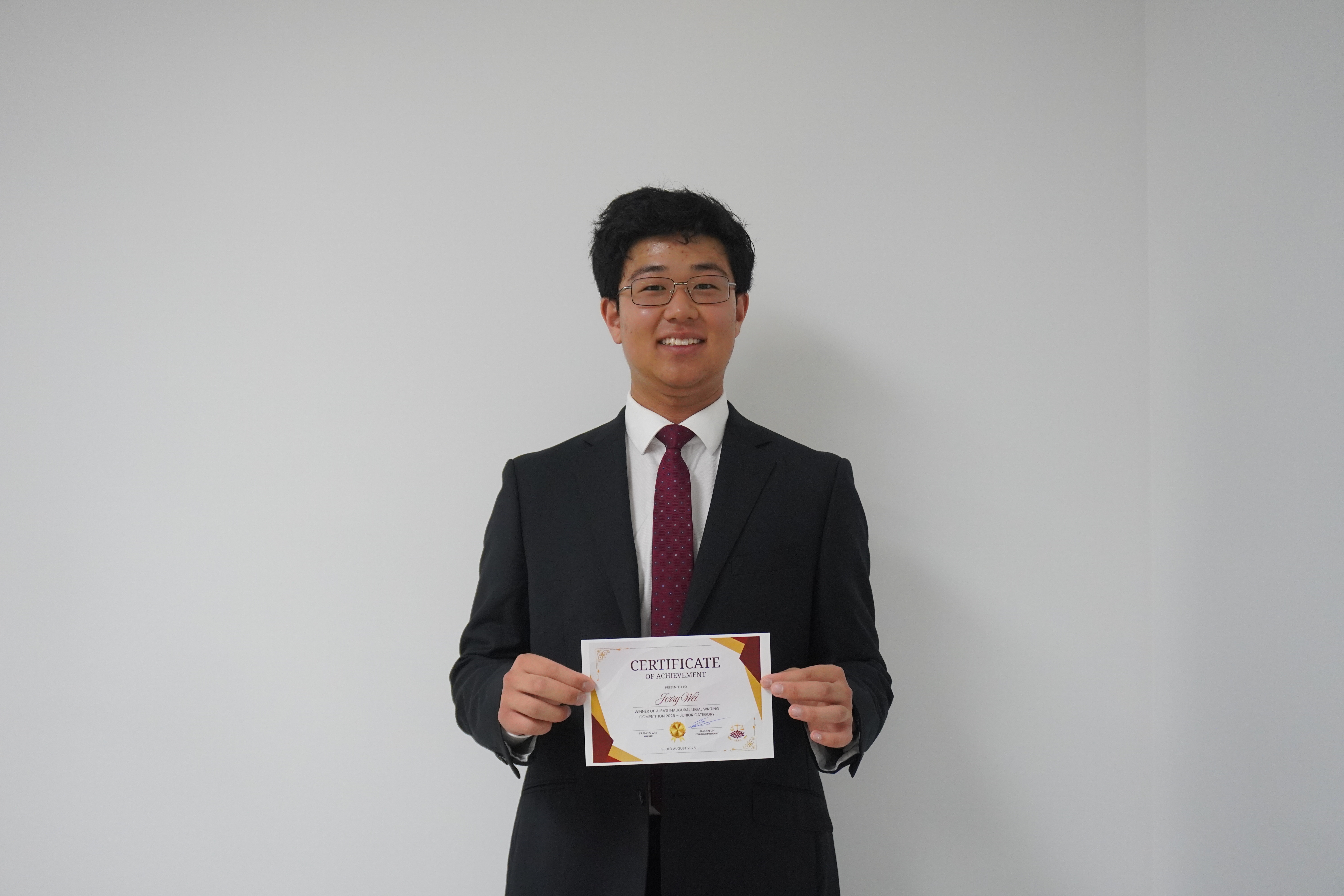 Jerry Wei, Junior category winner, with his certificate