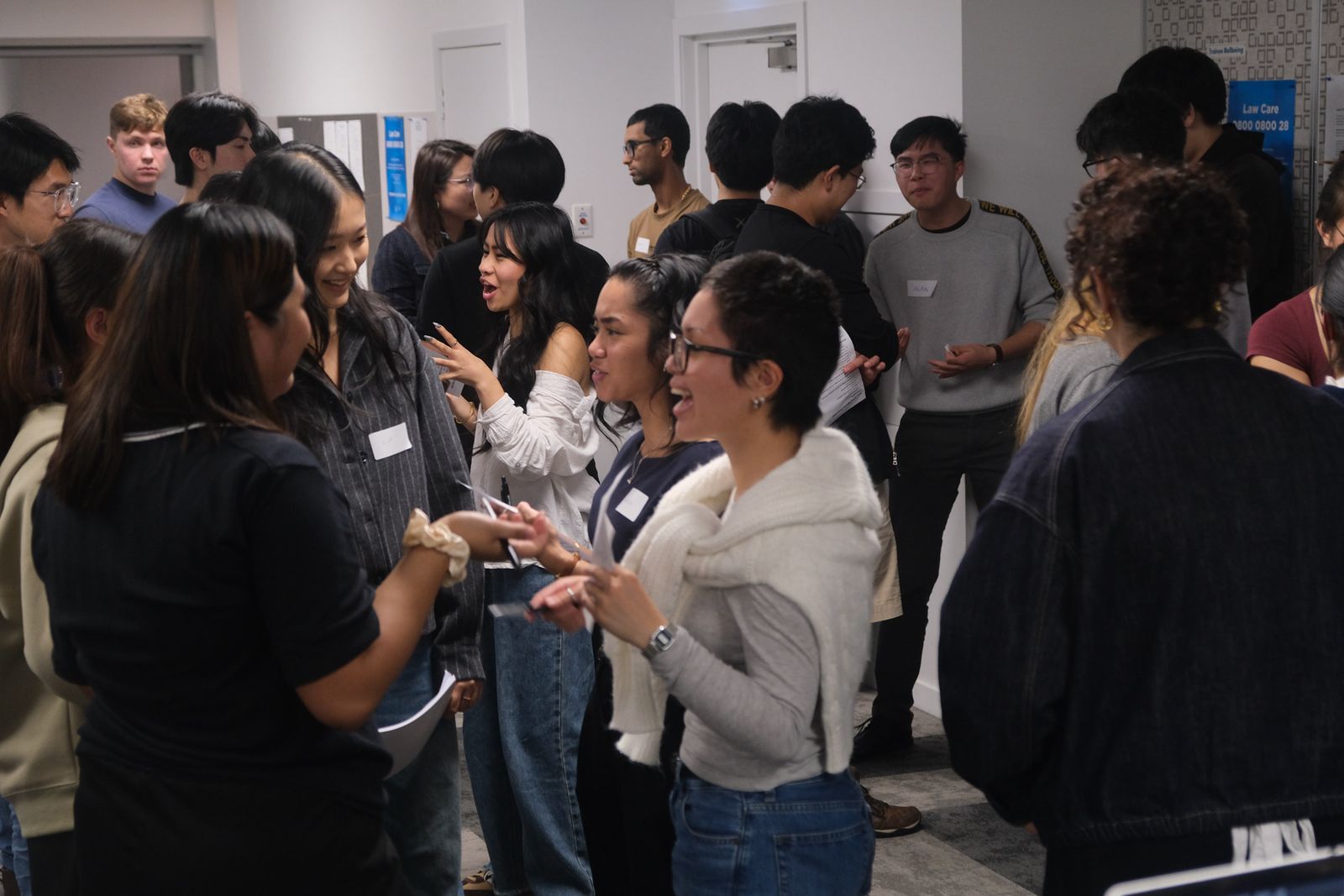 Students talking and laughing at ALSA's Inaugural Launch Night